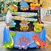 Lunmon banner front display showing colorful dinosaur theme and clear scripture message benefit