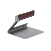 Made In grill press front view showing solid stainless steel and benefit of consistent pressure
