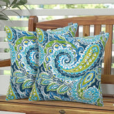 Magpie Fabrics front view of two paisley lapis green pillows shows coordinated elegance