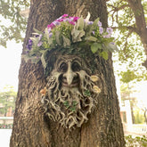 MARYTUMM front view planter showing whimsical tree face and pot benefit of charm