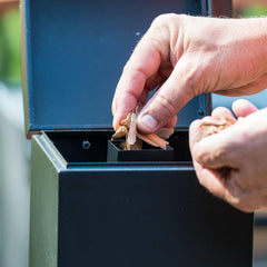 Masterbuilt detail of continuous wood chip feed providing up to six hours smoke