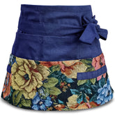 MILCIL apron front view showing pockets and floral design, keeps tools handy