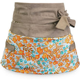 MILCIL apron front view showing pockets and durable canvas for organized gardening
