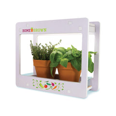 MindWare lamp on kitchen counter growing herbs illustrating convenient home use