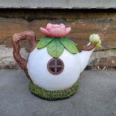 Mokoboho teapot house placed in garden scene adding instant fairy charm