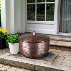 Monarch Abode close-up hand-hammered metal texture showing durable finish