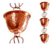 Monarch Rain Chains front view hung from gutter showing polished copper and elegant water flow benefit