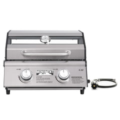 Monument Grills front view showing compact stainless-steel body and grilling surface for portability