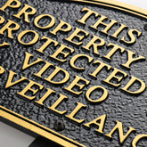 Morgtta front view plaque showing clear video surveillance message and curb appeal benefit