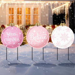 MorningRo front view of three pink Christmas ball signs for festive curb appeal
