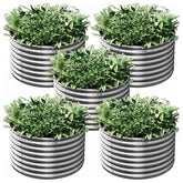 Mostmahes front view of five galvanized garden beds showing durability