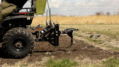 MotoAlliance Middle Buster attached to a garden tractor sleeve hitch, productive land prep