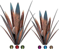Muciwa front view of two metal agave sculptures adding rustic style