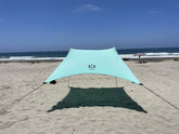Neso front view of seafoam tent showing full canopy and entrance for shade