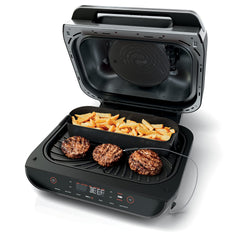 Ninja crisper basket in grill demonstrating simultaneous mains and sides cooking benefit