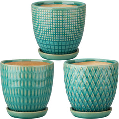 Oairse front view of three ceramic planters showing modern shape and decor appeal
