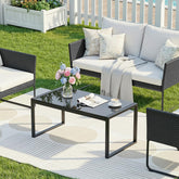 ONBRILL coffee table front view showing sleek black frame and glass top for modern style