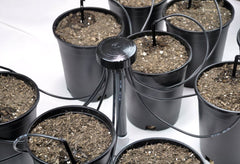 One Stop Outdoor close-up of stake tip and tubing barb for precise emitter positioning