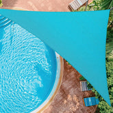 OOTONAT front view of turquoise shade sail showing full coverage and curb appeal