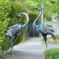 Oritty side profile of heron statue highlighting lifelike silhouette and balance