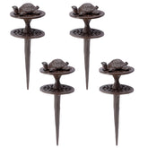 OwnMy front view of four cast iron hose guide stakes showing sturdy design and value