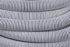 Poolmaster spiral-wound hose texture close-up showing crush-resistant durability benefit