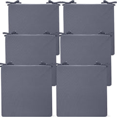 Preboun front view of six dark gray cushions showing neat stack and uniform look