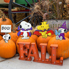 PRODUCTWORKS Snoopy beside ruler for scale showing size for porch or tabletop