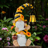 QZZP front view of bee gnome statue showing cheerful design and outdoor charm