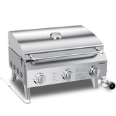 Raxmate front view of grill showing compact stainless steel housing and carrying handle for portability