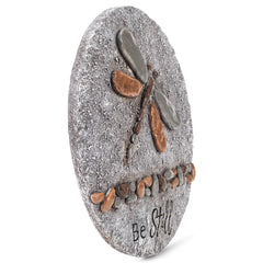 Roman stepping stone placed on garden pathway offering a peaceful decorative accent