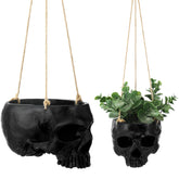 Romooa skull planter front view showing matte black finish and rope suspension benefit: dramatic focal point