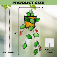 Royxen suncatcher hanging in window casting green light benefits ambiance