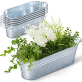 Sabary front view of six oval galvanized planters showing rustic style and coordinated set benefit