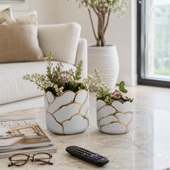 Sagebrook Home front view of two white ceramic planters showing elegant silhouette and balance
