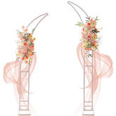 SATBIR arch front view showing white metal backdrop providing elegant event focal point