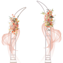 SATBIR arch front view showing white metal backdrop providing elegant event focal point