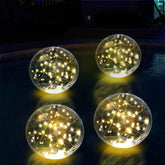 SATXTREM front view of four 14-inch floating glow balls showing warm light benefits