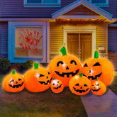 SEASONBLOW front view of inflated pumpkin patch glowing for festive curb appeal