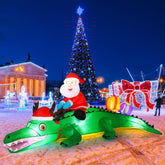 Shappy front view of inflatable crocodile showing festive LED lighting and curb appeal
