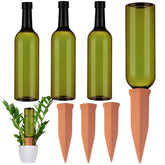 SiliFine front view of three terracotta spikes and green bottles, convenient set