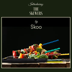 Skoo flat stainless steel skewer close-up showing secure hold