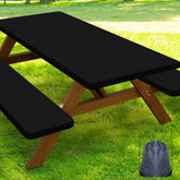 Smiry front view of folded table and bench covers showing neat packaging and portability
