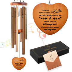 Soopau front view showing golden wind chime in black gift box, comforting presentation