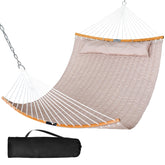 SUNCREAT front view of tan quilted hammock showing full bed and spreader bars for comfort