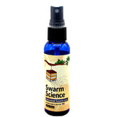 Swarm Science bottle front view showing attractant for easier trap setup
