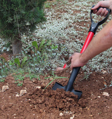 TABOR TOOLS shovel placed in raised garden bed demonstrating precise digging in tight spaces