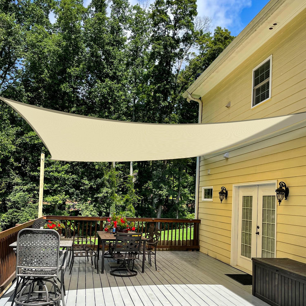 TANG front view of beige 12x16 sun sail showing full canopy and neutral color benefits