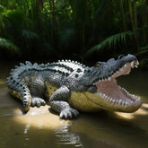 Teaeeno front view of realistic alligator statue showing lifelike pose and outdoor impact