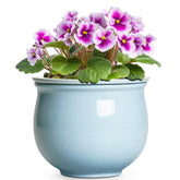 Teagas light blue planter front view showing elegant glaze and shape benefit decor